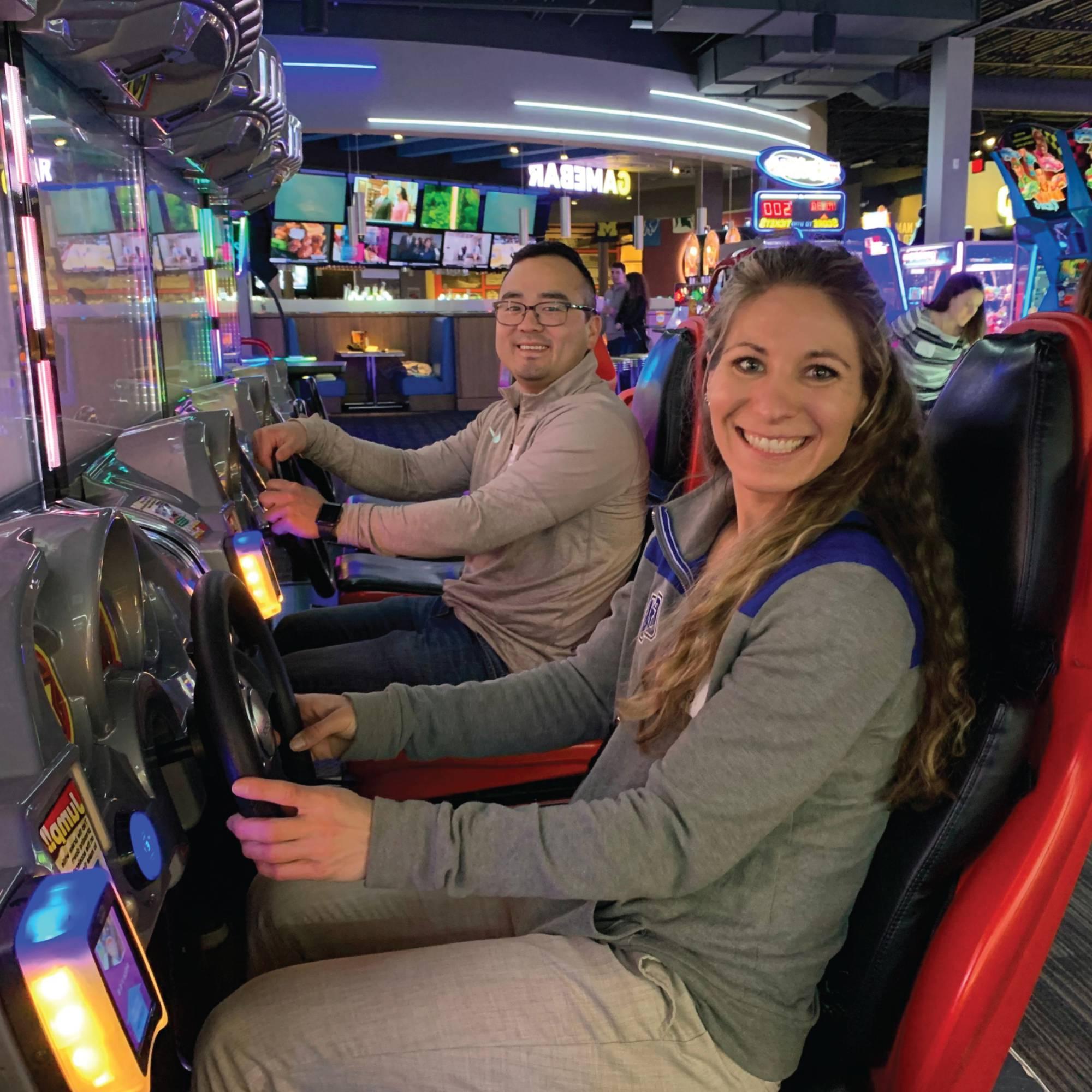 Photo of a couple of Alumni at the dave and busters event.